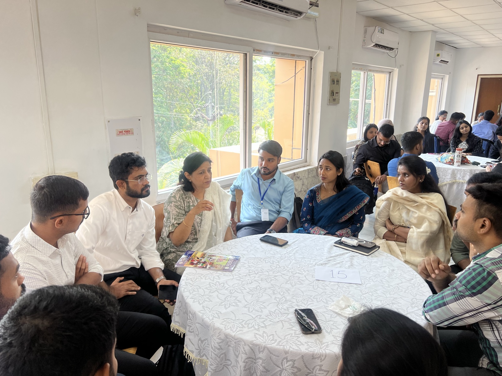 Participants listen closely during a Living Stories round-table session.